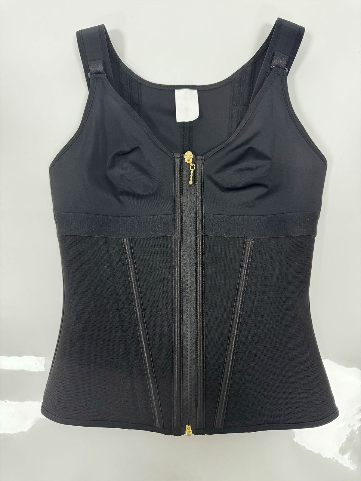 Chaleco de látex con corsé y sujetador